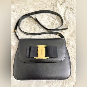 Salvatore Ferragamo Black Leather Clutch with Gold Accent